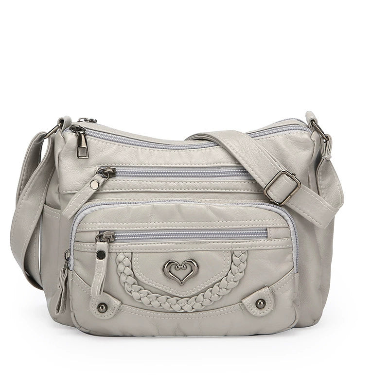 Chic Vintage Crossbody Bag with Heart Accent